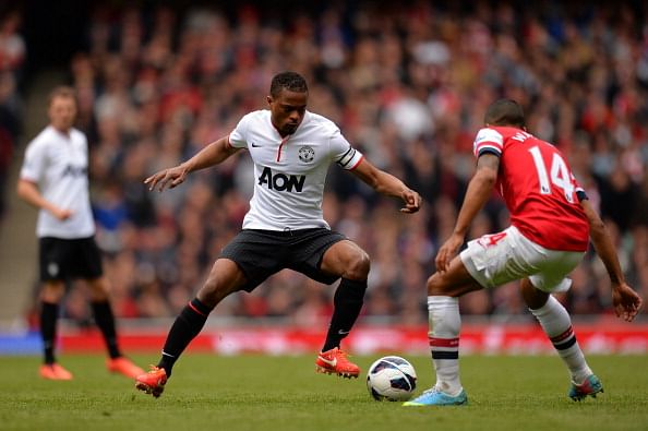 Patrice Evra of Manchester United on the ball during the Barclays Premier League match between Arsenal and Manchester United at Emirates Stadium on April 28, 2013 in London, England. (Photo by Shaun Botterill/Getty Images)
